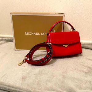 Small red authentic Michael Kors crossbody or handbag